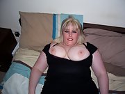 Sexy blonde shows off her big luscious breasts and pretty pussy