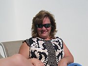 Spreading her legs in a couple of hotels horny milf pussy