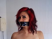 Hot ruby haired slut with perky tits is taped up