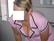 Sexy wife in massage uniform shows her pussy and big tits