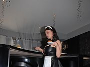 Sexy brunette maid is cleaning and doing a striptease too
