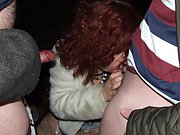 Cock hungry red head wife gives a double blowjob in dogging adventure