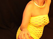 MILF In Little Yellow Dress Who Just Loves Showing Off What She has