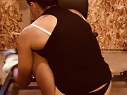 My wife working out wearing a black thong and letting her pussy show
