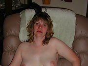 Blonde wife shows off her big tits wearing a white corset