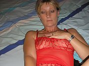 Temptress Tina is a beautiful MILF in lingerie and bare tits