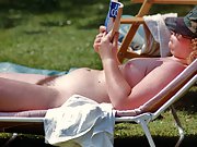 Nice chubby lady sunbathing and smiling naked. Lovely cute buttocks