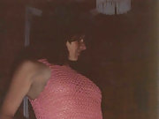 My wife stripping off seethrough vest - pert nipples and slim body