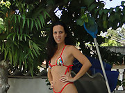 Brazilian slut wearing a small bikini to cover up her sexy body