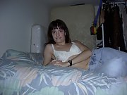 Sexy brunette wife shows off her perky tits and hairy pussy