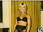 Mature blonde in black lingerie shows her pussy with friend