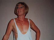 Mature blonde loves to show her pretty bare pussy