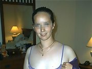 Brunette wife wearing purple lingerie shows off her big tits