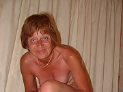 Mature woman displayed naked spreading well and showing