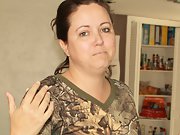 Chubby wife in camo takes off her clothes to show her naked body