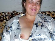 Nataly is in a night gown that shows her pussy