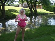 Barby in her own village naked flashing tits and pussy in public