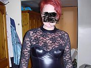 Beautiful redhead loves to wear leather lingerie and show pussy
