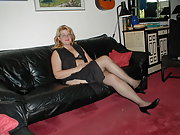Hot wife on the couch playing with her pussy using dildo