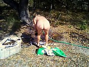 My hot wife does yard work in the nude with pussy hanging out