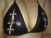 Wife shows off her big tits in her latex bra and thong