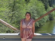 Bbw loves showing her pendulous breasts out by the lake