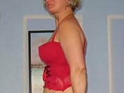 Sexy mature wife shows off her big tits in lingerie