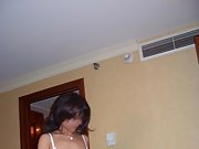 Mature brunette shows her lingerie and gives a blow job