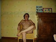Mature wife spreads her legs