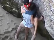 Young and wild lovers get caught making love on the beach by voyeur
