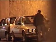 Voyeur catches a horny couple having sex on the car outdoor