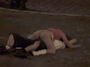 Young atractive couple caught having sex in public park at night